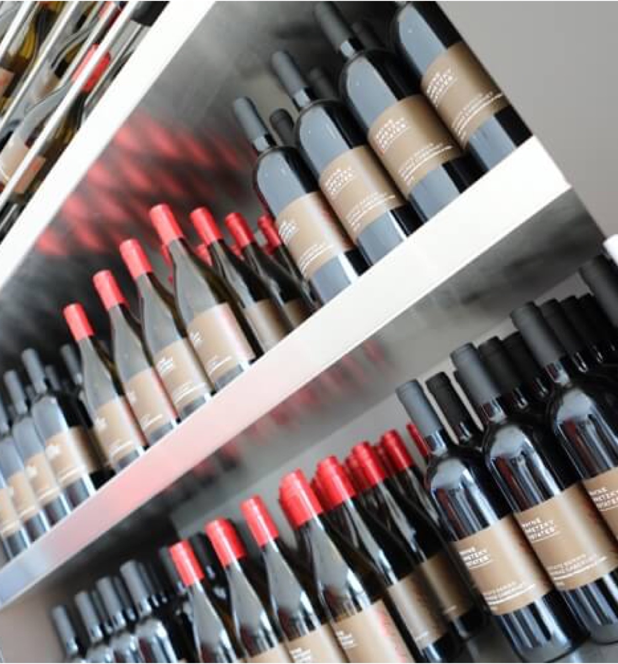 Wine shelf with many kind of wines.